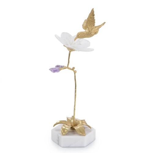 Hummingbird and selenite sculpture