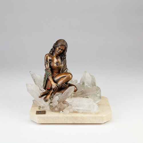 Woman resting on rock