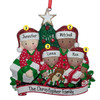 image of Mixed Race Family of Four Opening Gifts by Christmas Tree ornament