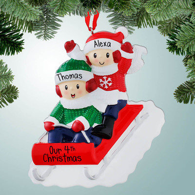 Personalized Couple Riding Red Sled Christmas Ornament Personalized Couple Riding Red Sled Christmas Ornament