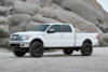 Fabtech 09-13 Ford F150 4WD 4in Perf Sys w/Dlss 2.5 C/O Resi & Rr Dlss - K2198DL