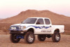 Fabtech 95.5-04 Toyota Tacoma 6 Cyl 2/4WD 6 Lug 6in Perf Sys w/Perf Shks - K7002