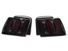 Raxiom 99-04 Ford Mustang Excluding 99-01 Cobra Icon LED Tail Lights- Black Housing (Smoked Lens) - 100807