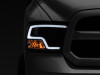Raxiom 09-18 RAM 1500 LED Halo Projector Headlights- Black Housing (Clear Lens) - R111516