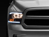 Raxiom 09-18 Dodge RAM 1500/2500/3500 Axial Series Headlights w/ LED Bar- Blk Housing (Clear Lens) - R131481