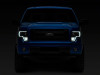 Raxiom 09-14 Ford F-150 Axial G4 Light Bar Switchback Projector Headlights- Blk Housing (Clear Lens) - T546755