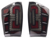 Raxiom 16-23 Toyota Tacoma LED Tail Lights- Blk Housing (Smoked Lens) - TT32385