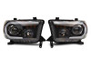 Raxiom 07-13 Toyota Tundra Axial Projector Headlights w/ SEQL LED Bar- Blk Housing (Clear Lens) - TU16007