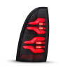 AlphaRex 05-15 Toyota Tacoma LUXX LED Taillights Alpha Blk w/Activ Light/Seq Signal - 680050 User 2