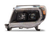 Raxiom 05-11 Toyota Tacoma Axial Series Switchback Projector Headlights- Black Housing- Clear Lens - TT23361 Photo - Primary