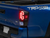 Raxiom 16-23 Toyota Tacoma XW Series Sequential LED Tail Lights- Black Housing- Clear Lens - TT30331 Photo - Primary