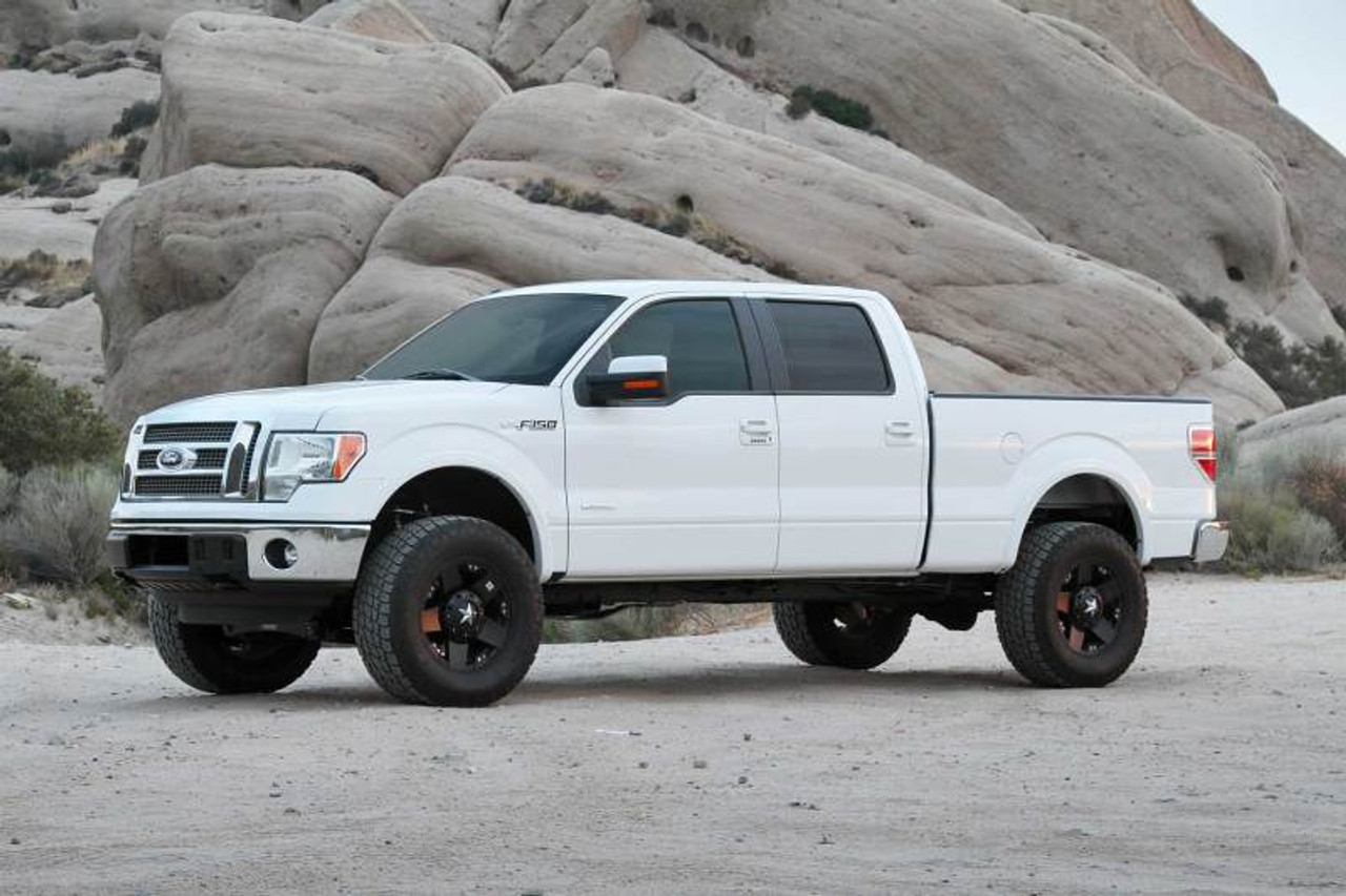 Fabtech 09-13 Ford F150 4WD 4in Perf Sys w/Dlss 2.5 C/O Resi & Rr Dlss - K2198DL