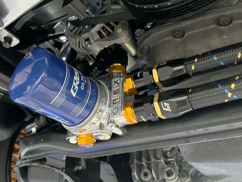 GReddy AN04 STRAIGHT HOSE END SWIVEL BLACK/GOLD ANODIZED - 12800400 Photo - Close Up