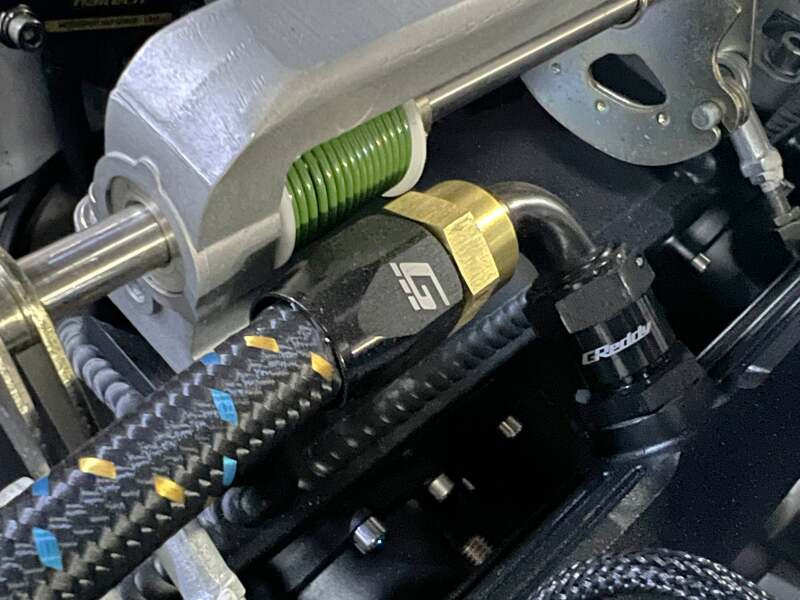 GReddy AN04 STRAIGHT HOSE END SWIVEL BLACK/GOLD ANODIZED - 12800400 Photo - Close Up