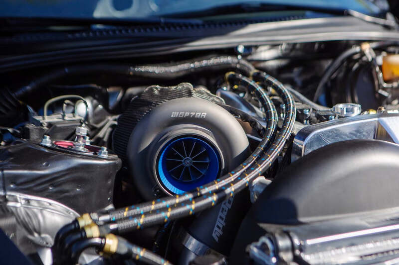 GReddy AN12 REUSABLE HOSE NYLON BRAIDED BLACK/GOLD/BLUE (PRICED PER FOOT) - 12851200 Photo - Close Up