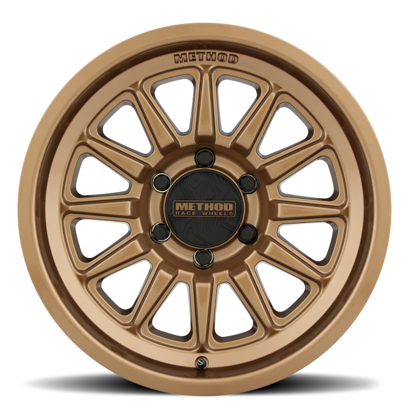 Method MR323 - 17x8.5 / 6x5.5 / ET 25 / 106.25 CB - Gloss Bronze - MR323785601525 Photo - Close Up