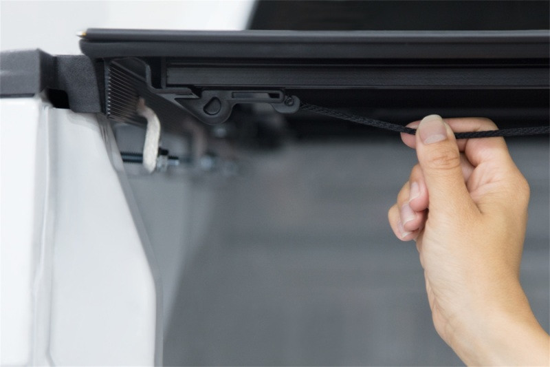 Access LOMAX Pro Series Tri-Fold Cover 07-13 Chevy 1500 5ft 8in Bed (Excl Classic) Blk Diamond Mist - B0020059