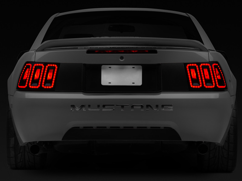 Raxiom 99-04 Ford Mustang Excluding 99-01 Cobra Icon LED Tail Lights- Black Housing (Smoked Lens) - 100807