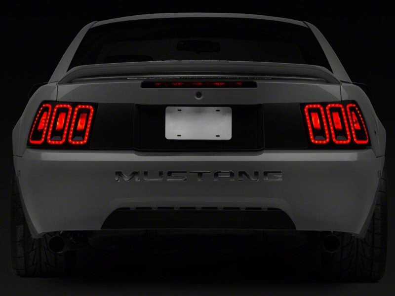Raxiom 99-04 Ford Mustang Excluding 99-01 Cobra Icon LED Tail Lights- Black Housing (Smoked Lens) - 100807