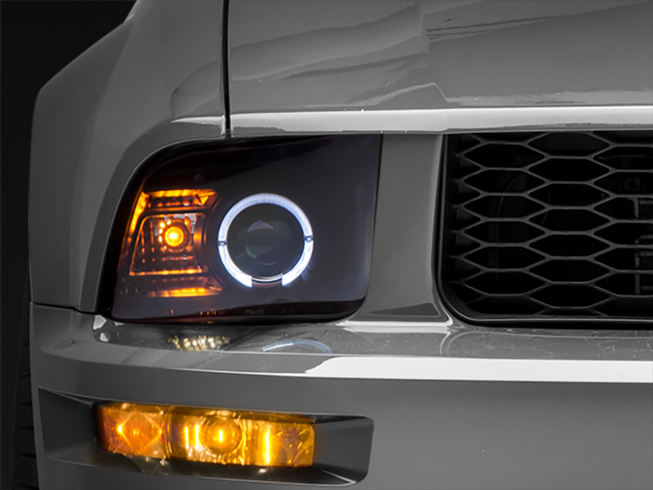 Raxiom 05-09 Ford Mustang Halogen 2010 Style LED Halo Headlights-Blk Hsng(Clear Lens/Excludes GT500) - 101682