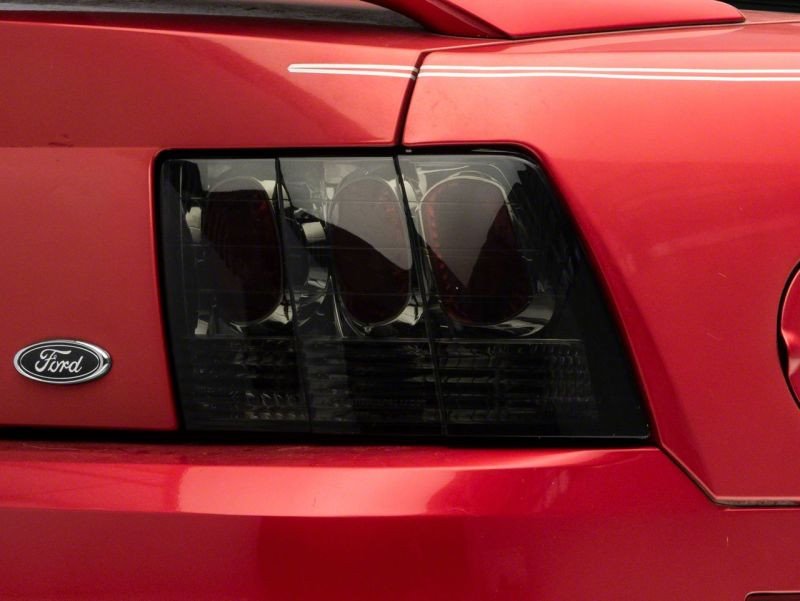 Raxiom 99-04 Ford Mustang Axial Series Altezza Style Tail Lights- Blk Housing (Smoked Lens) - 413422