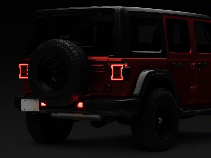 Raxiom 18-23 Jeep Wrangler JL Moab Rubicon Sahara Axial LED Rear Bumper Reflector Lights- Clear - J134140-JL