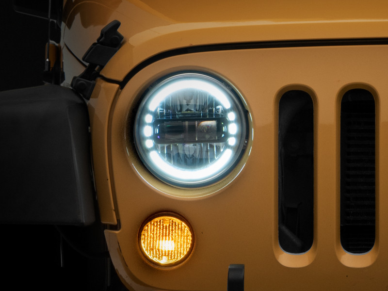 Raxiom 97-18 Jeep Wrangler TJ/JK Axial 7-Inch LED Headlights w/ DRL- Black Housing (Clear Lens) - J155570