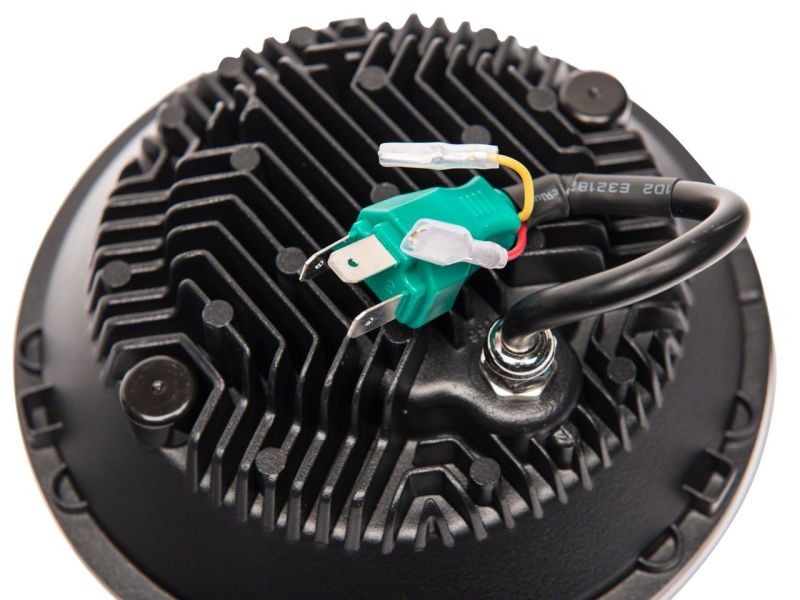 Raxiom 07-18 Jeep Wrangler JK Axial 7-In LED Headlights w/ DRL Turn Signals- Blk Housing (Clear) - J173078