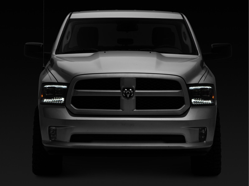 Raxiom 09-18 RAM 1500 LED Projector Headlights w/ Switchback Turn Signals- Blk Housing (Clear Lens) - R111520