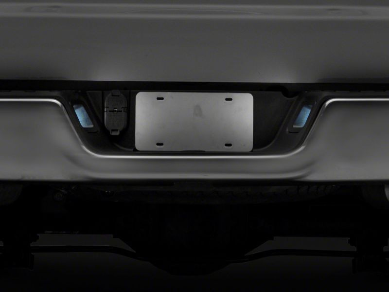Raxiom 13-18 Dodge RAM 1500 Axial Series LED License Plate Lamps- Smoked - R117120
