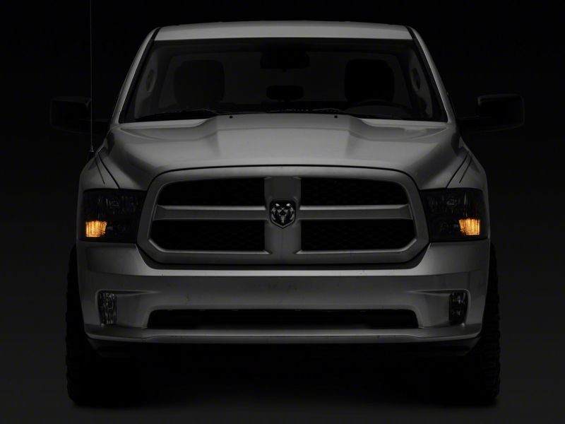Raxiom 09-18 Dodge RAM 1500 Axial Series Euro Style Headlights w/ Dual Bulb Blk Housing (Clear Lens) - R118016