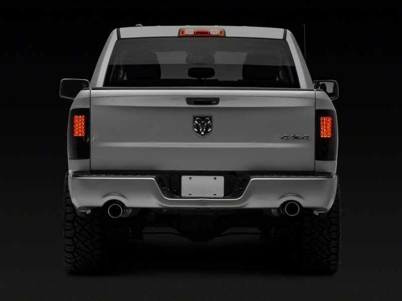 Raxiom 09-18 Dodge RAM 1500/2500/3500 Axial Series LED Tail Lights- BlkHousing- SmokedLens - R131283