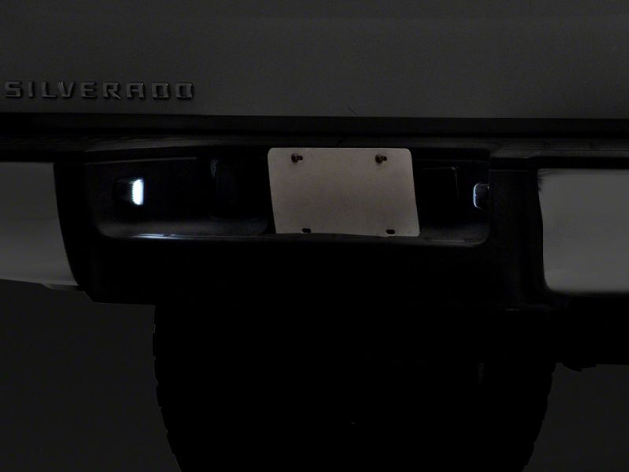 Raxiom 01-13 Chevrolet Silverado/GMC Sierra 1500 Axial Series LED License Plate Lamps- Smoked - S122507