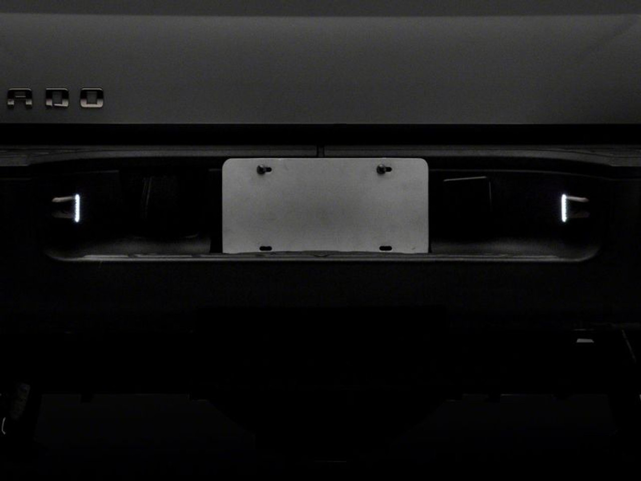 Raxiom 01-13 Chevrolet Silverado/GMC Sierra 1500 Axial Series LED License Plate Lamps- Smoked - S122507