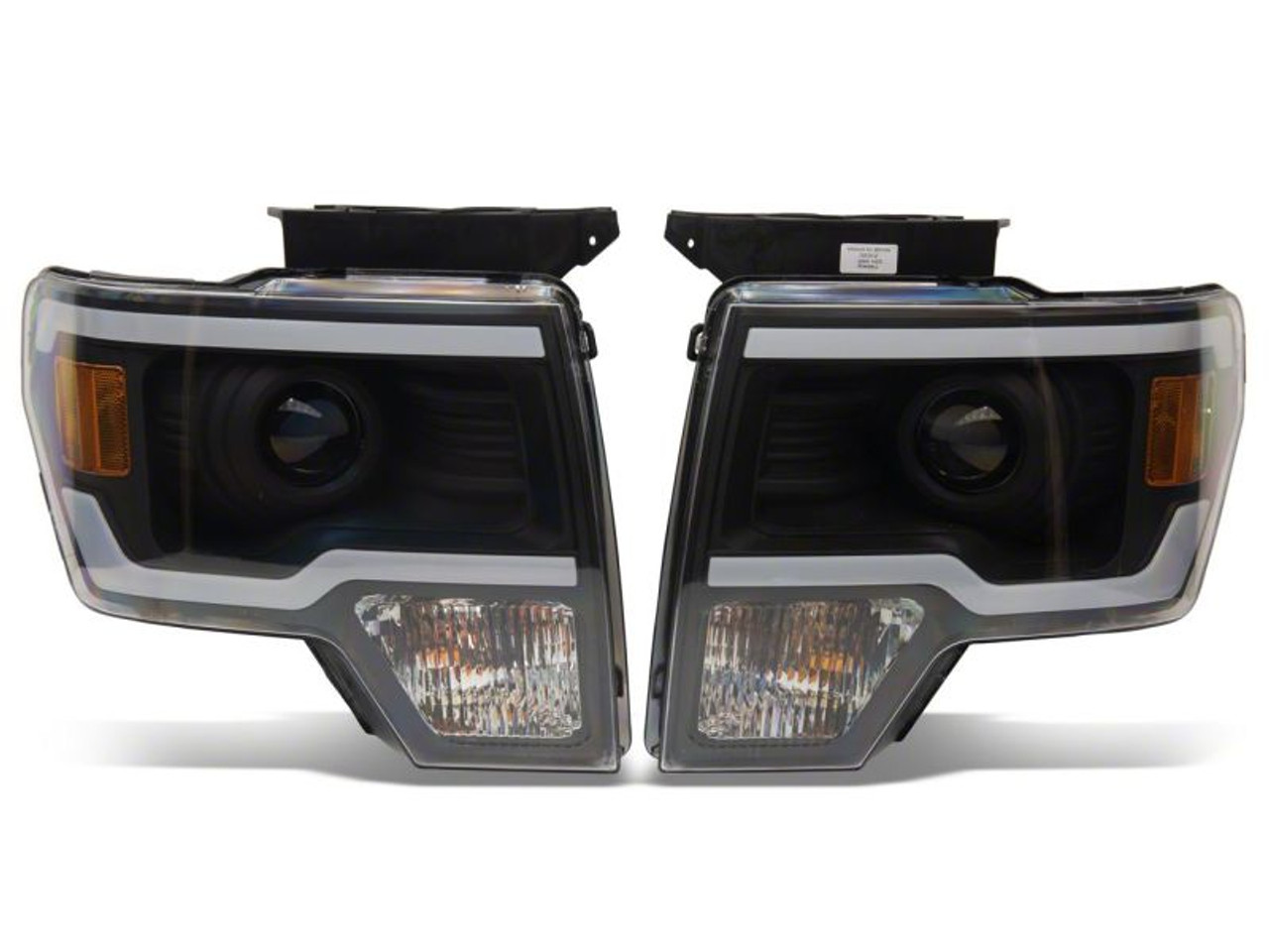 Raxiom 09-14 Ford F-150 Axial Series Projector Headlights w/ LED Light Bar- Blk Housing (Clear Lens) - T566369