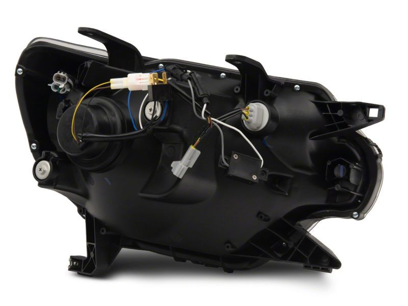 Raxiom 12-15 Toyota Tacoma Axial Projector Headlights w/ SEQL LED Bar- Blk Housing (Clear Lens) - TT21850