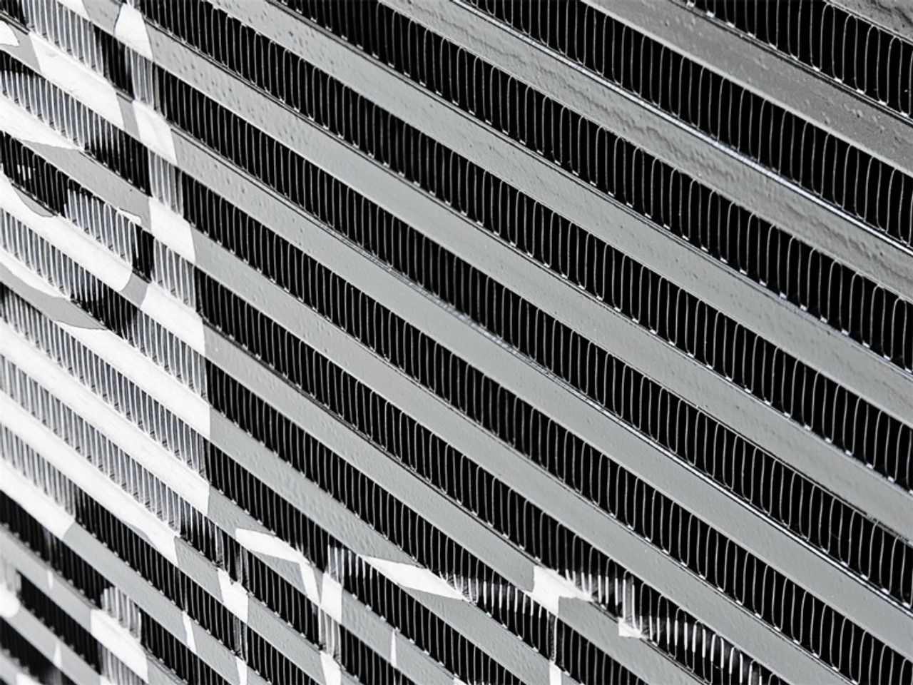 aFe BladeRunner GT Series Bar and Plate Radiator w/ Black Hoses 07-11 Jeep Wrangler (JK) V6 3.8L - 46-50002-B