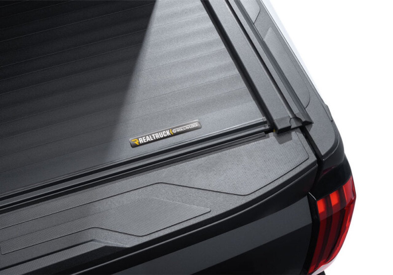 Roll-N-Lock 2022 Toyota Tundra (66.7in. Bed Length) A-Series XT Retractable Tonneau Cover - 575A-XT
