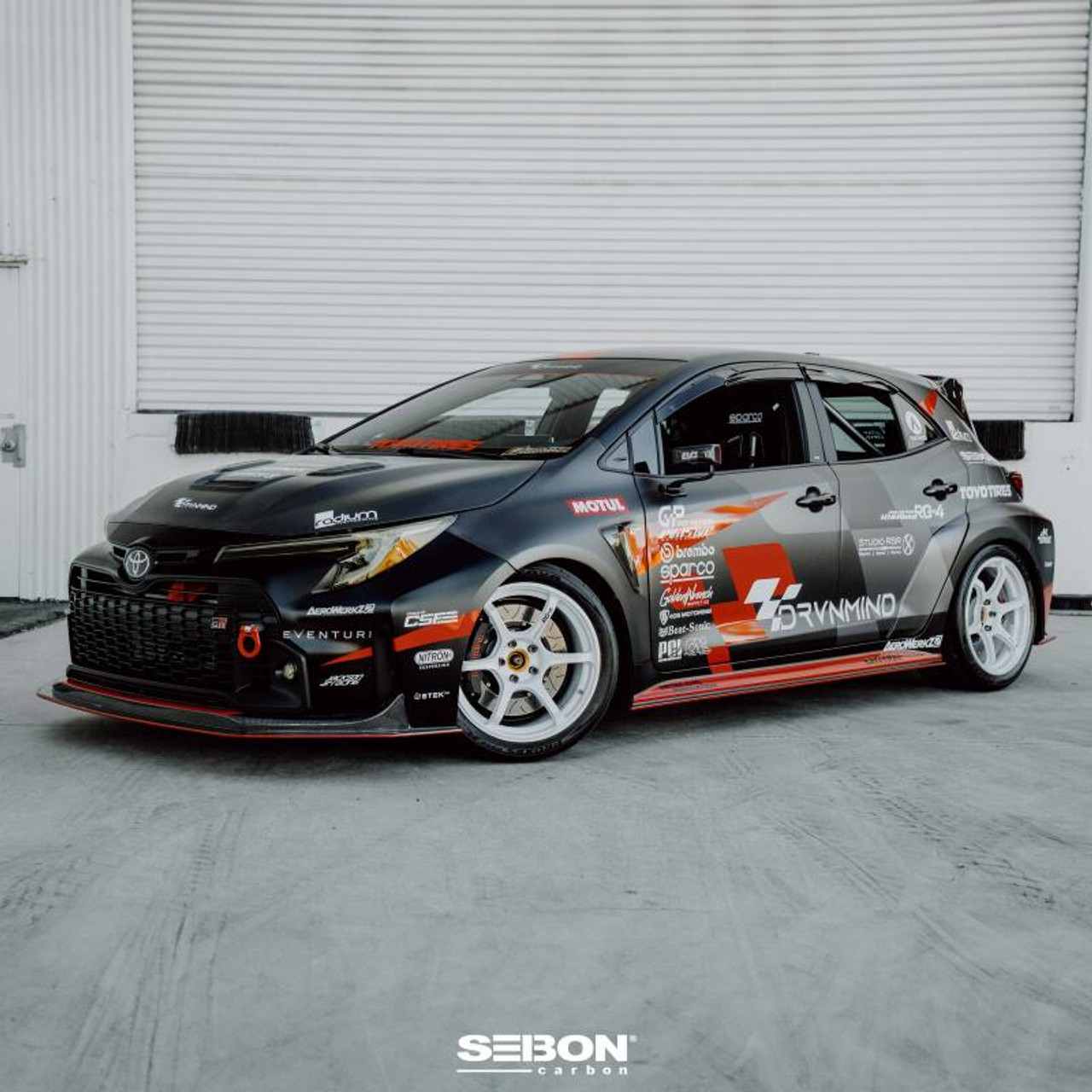Seibon 2023+ Toyota GR Corolla MB-Style Carbon Fiber Front Lip - FL23TYGRCOR-MB