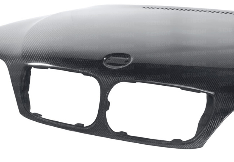 Seibon 02-05 BMW 3 Series 4dr E46 (Manuf Date 7/02-7/06 Models Only) OEM-Style Carbon Fiber Hood - HD0205BMWE464D-OE