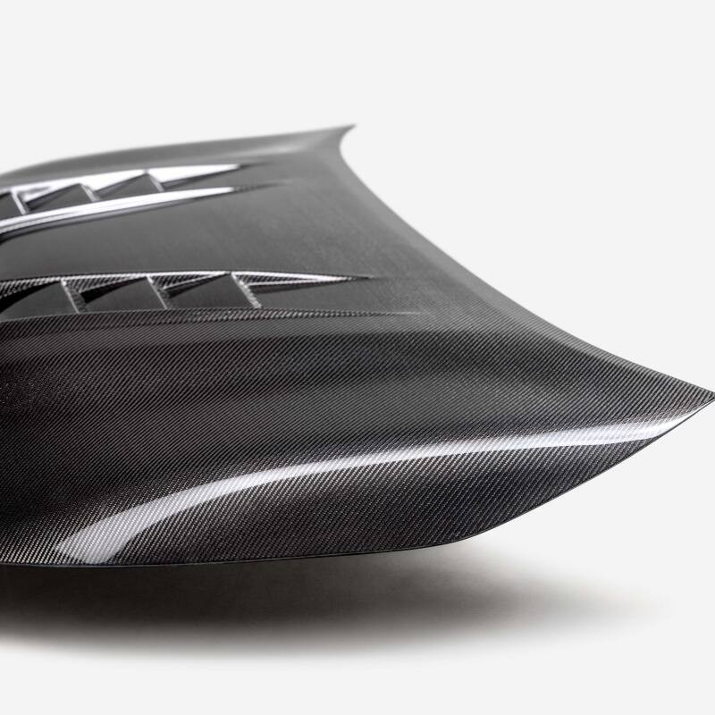 Seibon 23-25 Toyota Corolla GR TV-Style Double-Sided Carbon Fiber Hood - HD23TYGRCOR-TV-DS
