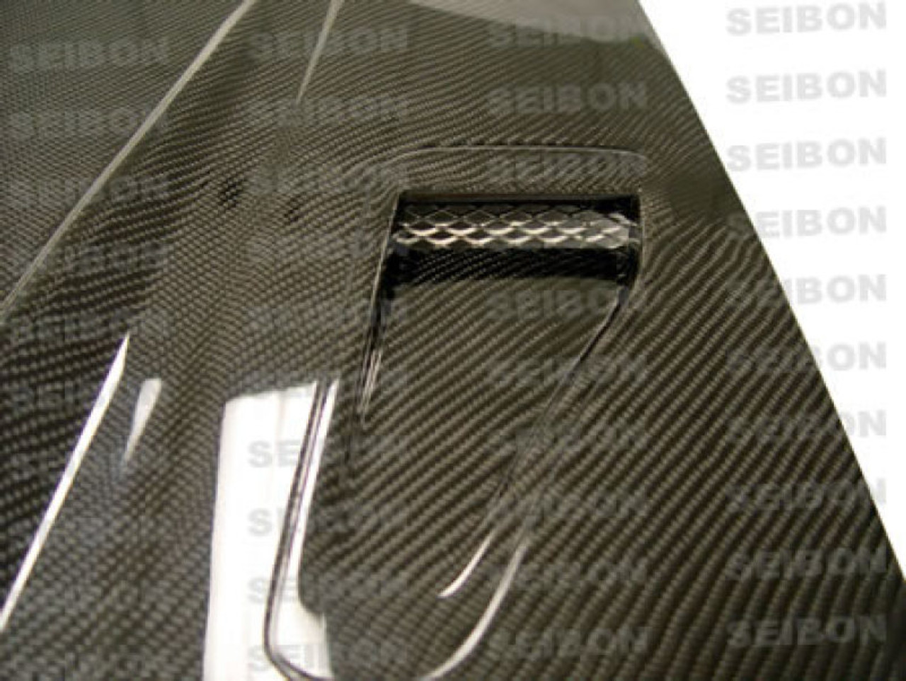 Seibon 99-01 Nissan S15 DV IICarbon Fiber Hood - HD9901NSS15-DVII