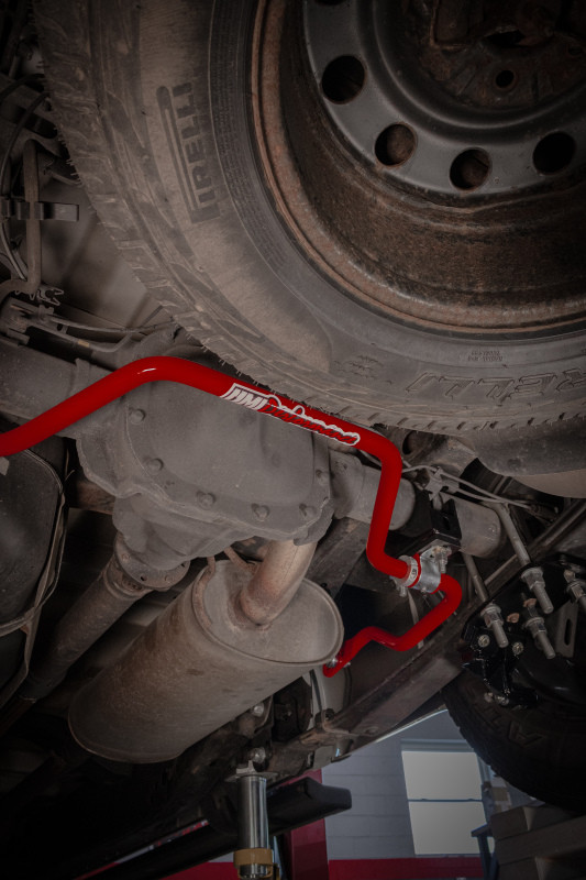 UMI Performance 15-24 Ford F-150 1in Solid Rear Sway Bar - Red - 6580-R User 3
