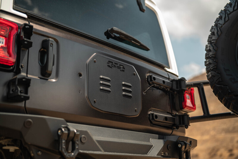 DV8 18-25 Jeep Wrangler JL Body Mounted Tire Carrier - TCJL-14 Photo - out of package