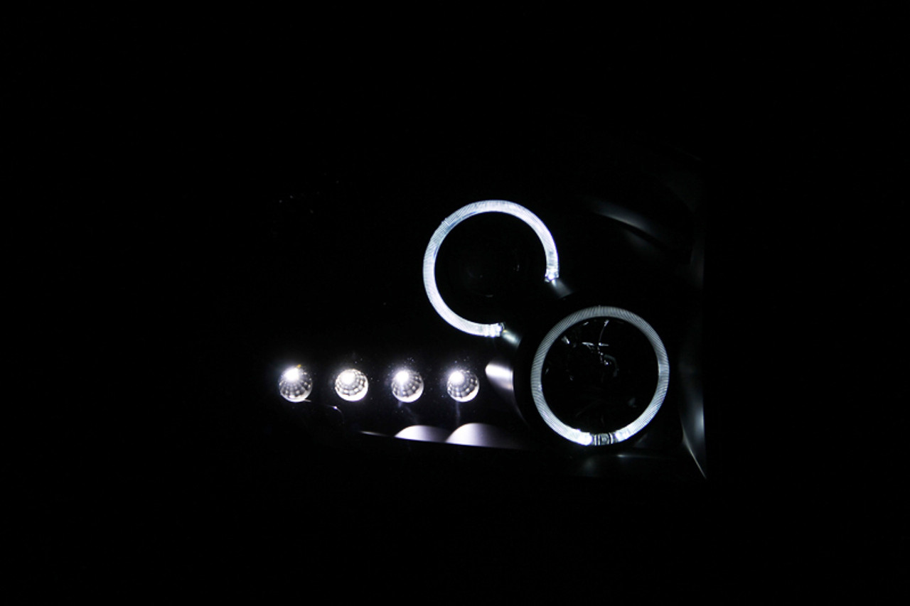 ANZO 2006-2008 Dodge Ram 1500 Projector Headlights w/ Halo Black - 111209