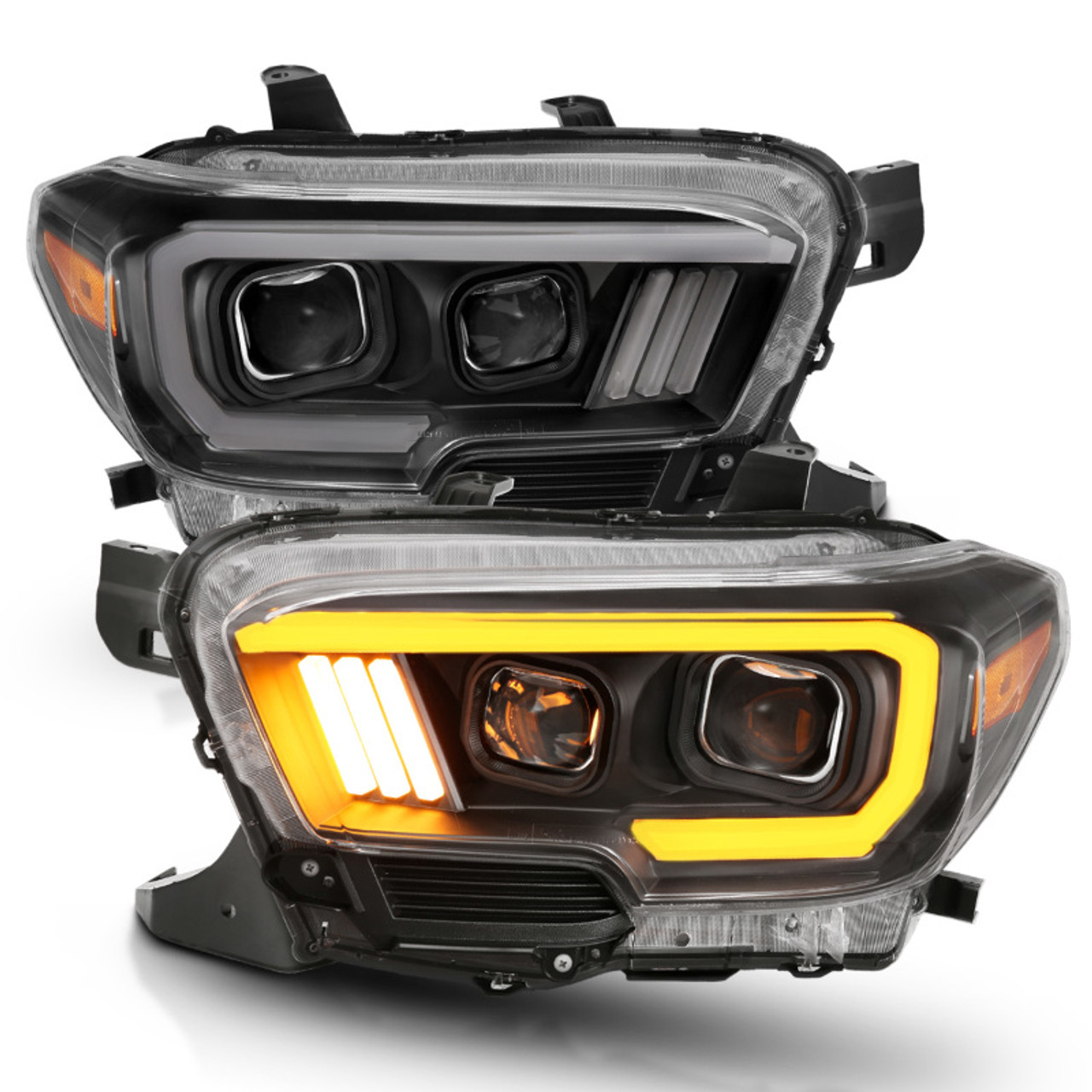 ANZO 2016-2017 Toyota Tacoma Projector Headlights w/ Plank Style Switchback Black w/ Amber - 111396