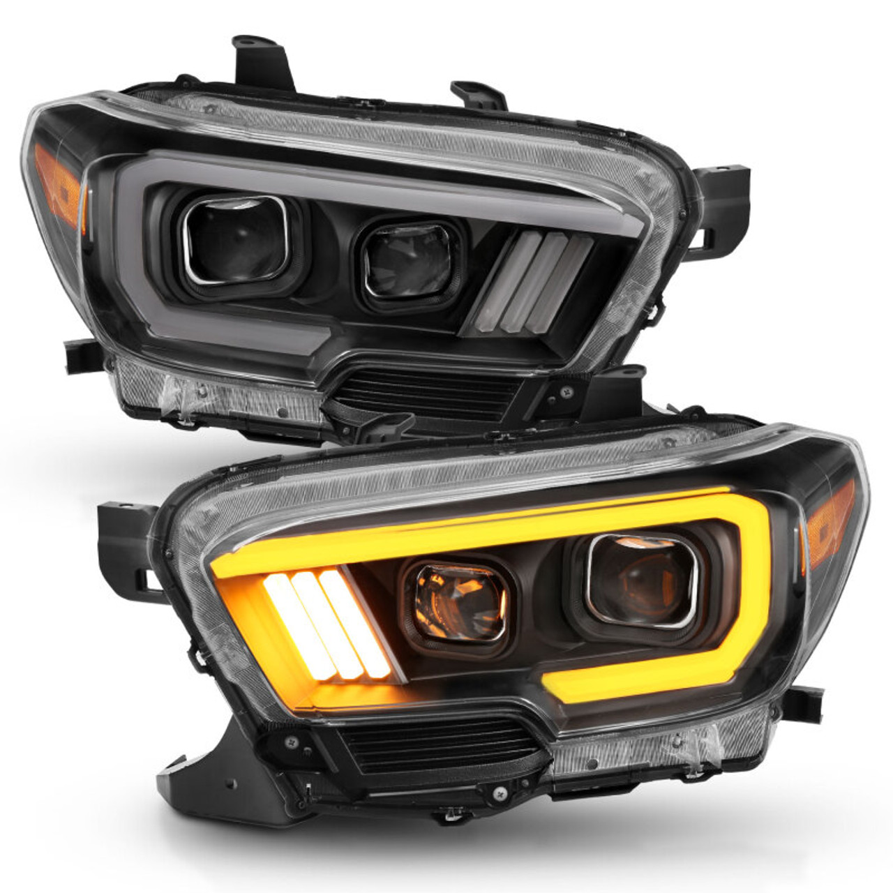 ANZO 2016-2017 Toyota Tacoma Projector Headlights w/ Plank Style Switchback Black w/ Amber w/ DRL - 111397