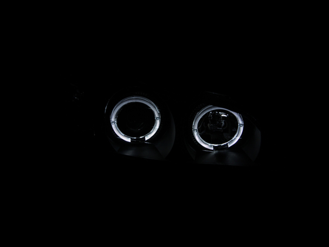 ANZO 2000-2004 Infiniti I30 Projector Headlights w/ Halo Black - 121077
