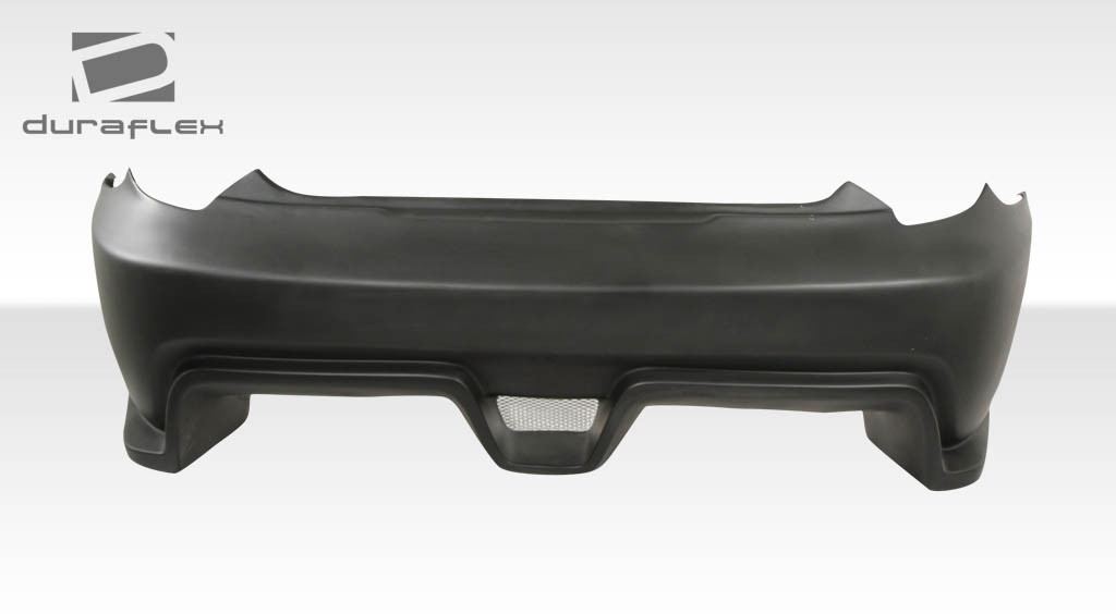 2000-2005 Toyota Celica Duraflex Bomber Rear Bumper Cover - 1 Piece / Vehicle Year Make Model Trim - 2000-2005-Toyota Celica ALL / Product Type - Rear Bumper / Style Name -Bomber / Kit Material - FRP (Fiberglass Reinforced Plastics) / Notes -