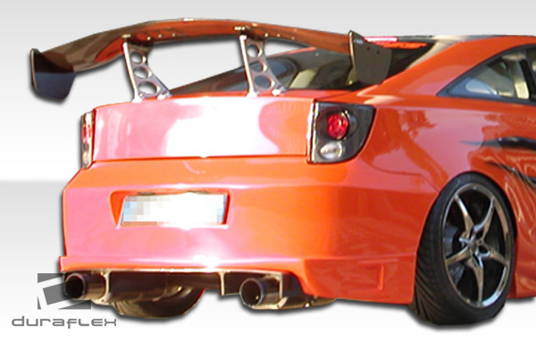 2000-2005 Toyota Celica Duraflex Blits Rear Bumper Cover - 1 Piece / Vehicle Year Make Model Trim - 2000-2005-Toyota Celica ALL / Product Type - Rear Bumper / Style Name -Blits / Kit Material - FRP (Fiberglass Reinforced Plastics) / Notes -